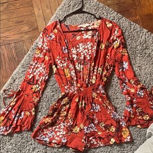 Floral romper with a deep V